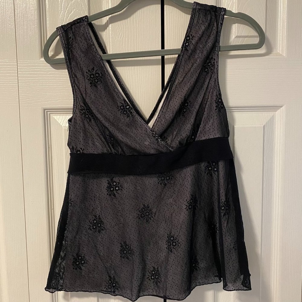 Charlotte Russe L tank white with black lace on top.